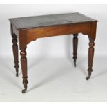 A Victorian mahogany side table, with a green leather inlay to the top and turned supports,