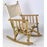 A folding rocking director's chair,