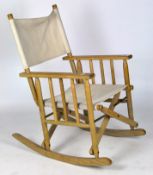 A folding rocking director's chair,