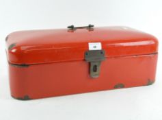 A Scandinavian red enamel box, with curved edges and a hinged lid,