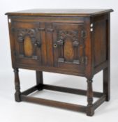 An oak side table and a cupboard, early 20th century,