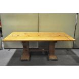 A large pine kitchen table. 105cm x 69cm x 195cm.