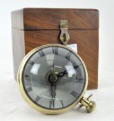 A novelty desk clock, modelled as a glass orb style pocket watch,