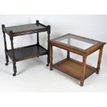 A vintage dark stained oak food trolley together with a contemporary coffee table