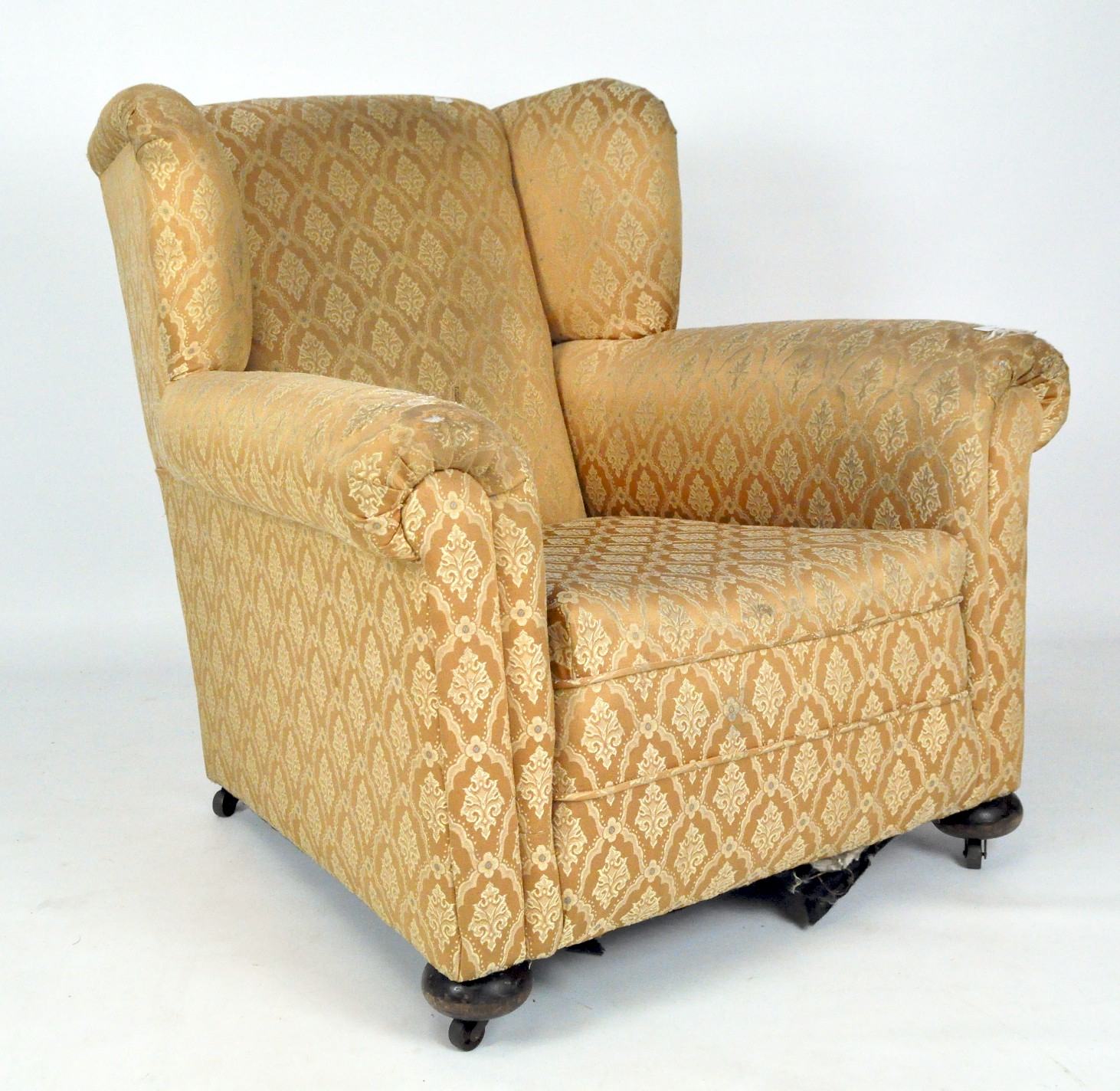 Victorian upholstered armchair, in gold damask style fabric,