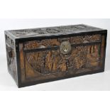 An Asian carved camphor wood blanket box,