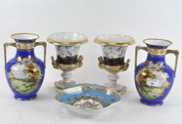 A pair of porcelain campagna urns with a pair of Noritake porcelain vases and a porcelain dish