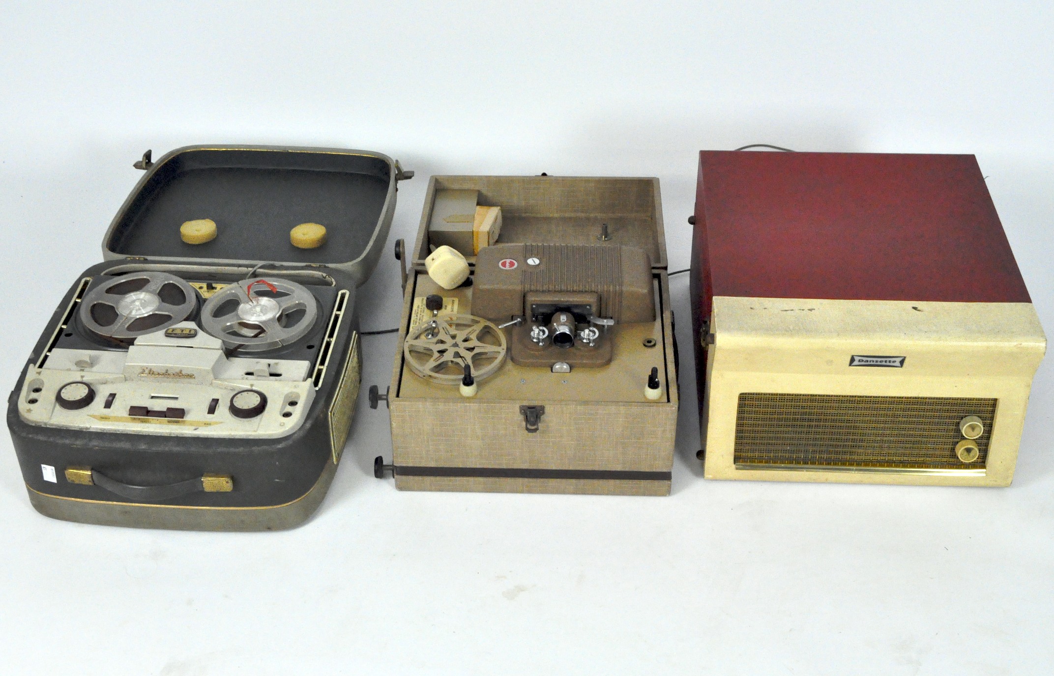 A Dansette Monarch 1960s record player in red and beige leatherette box and more