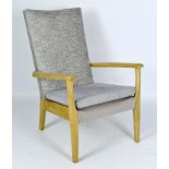 A Parker Knoll chair, teak structure, with two upholstered cushions,