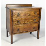 An oak three drawer chest, 20th century, on square legs