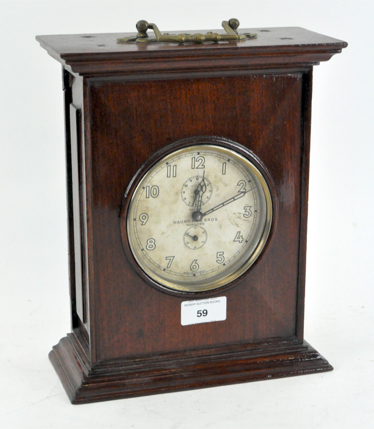 A German (Mauthe) clock, retailed in Rangoon,