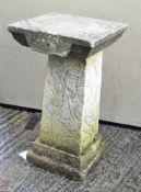 A large square sundial pedestal, the pedestal moulded on all sides with birds on branches,