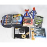 A selection of vehicle related items to include car jacks tyre air compressor and other items.
