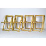 Four modern pine slatted folding chairs,