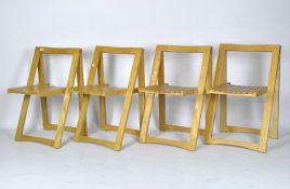 Four modern pine slatted folding chairs,