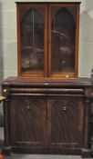 A Victorian mahogany bookcase in the Gothic style,