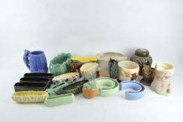 A collection of ceramics, including Sylvac and Beswick vases, wall pocket and ginger jar,