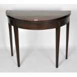 A Victorian mahogany gateleg card table, of demi lune form,