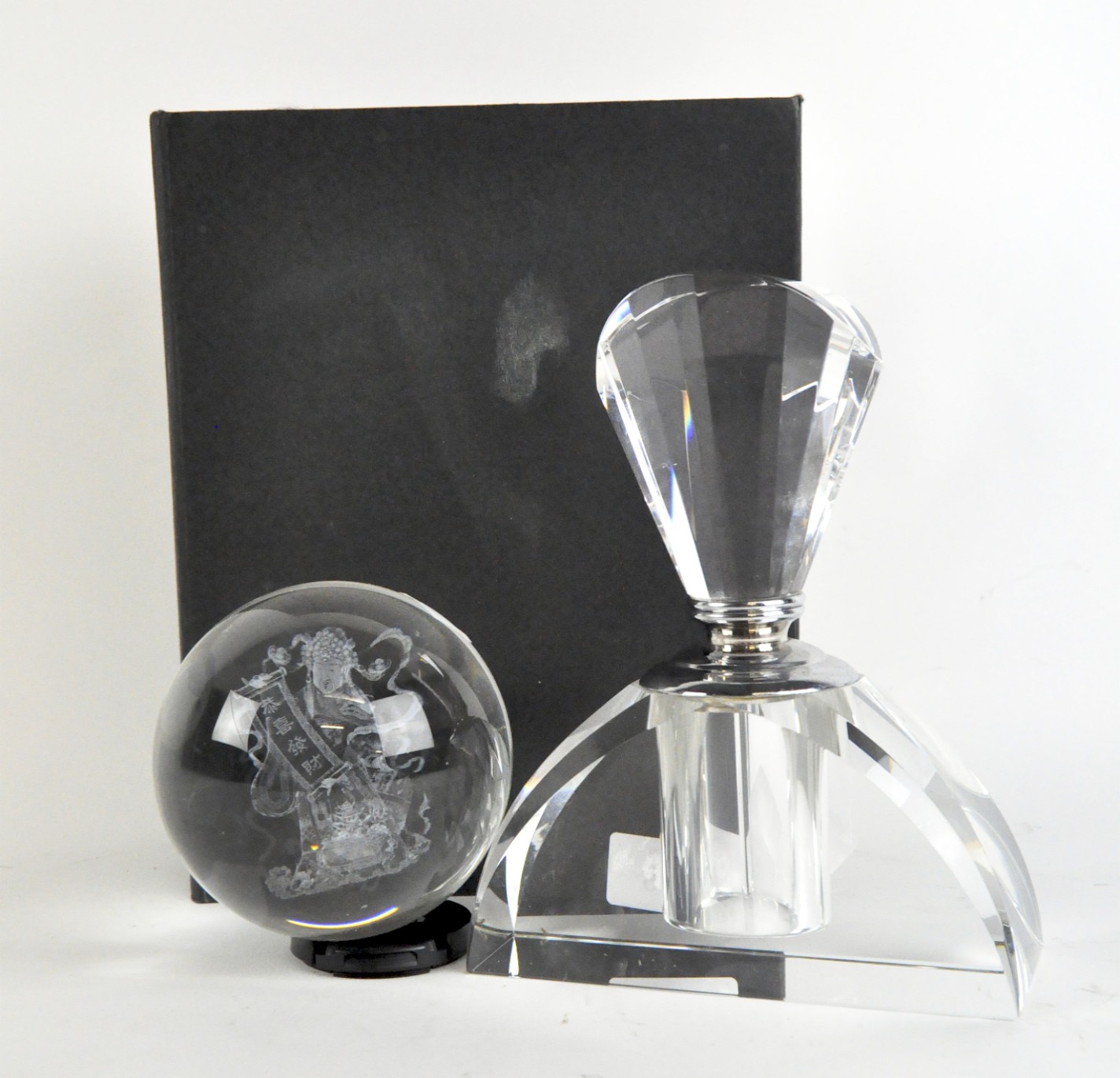 An Art Deco style boxed perfume bottle and a glass orb