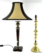 Two large modern table lamps, one being brass, the other wood and brass mounted,