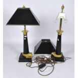 A pair of 20th century black and gilt table lamps with gilt flame tops and matching square shades,
