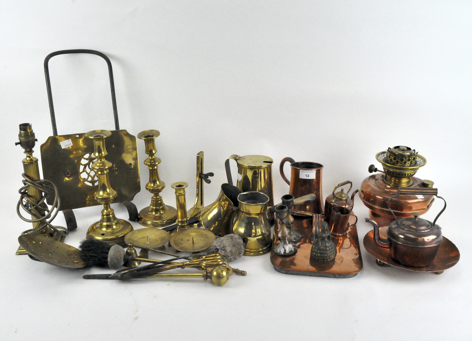 A selection of assorted metalware, most being brassware, including an oil lamp base,