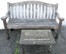 A teak garden bench, length 157cm, and a small low table,
