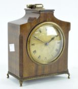 A 20th Century French mahogany veneered mantel clock, with platform escapement,