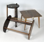 An oak Arts and Crafts jardiniere stand together with a book shelf and an occasional table