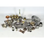 An assortment of silver plated and metal wares, to include a three piece tea set, goblets,
