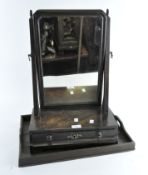 A 19th Century mahogany dressing table swing mirror, 58cm high and a wooden rectangular tray