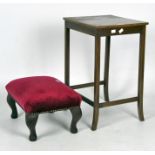 An early 20th century walnut side table and a modern footstool, the side table on outswept legs,