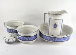 A ceramic wash set comprising a jug, bowl and two chamber pots,