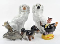 A pair of Staffordshire pottery dogs and more
