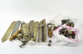 A collection of brass door plates and fittings