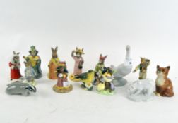 A selection of ceramic figures, including Royal Doulton Bunnykins pieces; Judge Bunnykin,
