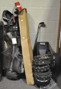 A large collection of golfing equipment, including Texan, Bronty, Fazer 3 wood,