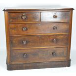 A early 20th Century mahogany chest of drawers, curved edges,
