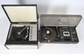 A Bush Arena Hi-Fi Audio System 1500 record player and a Garrard record player,