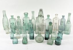 A collection of assorted glass bottles, various sizes and designs,