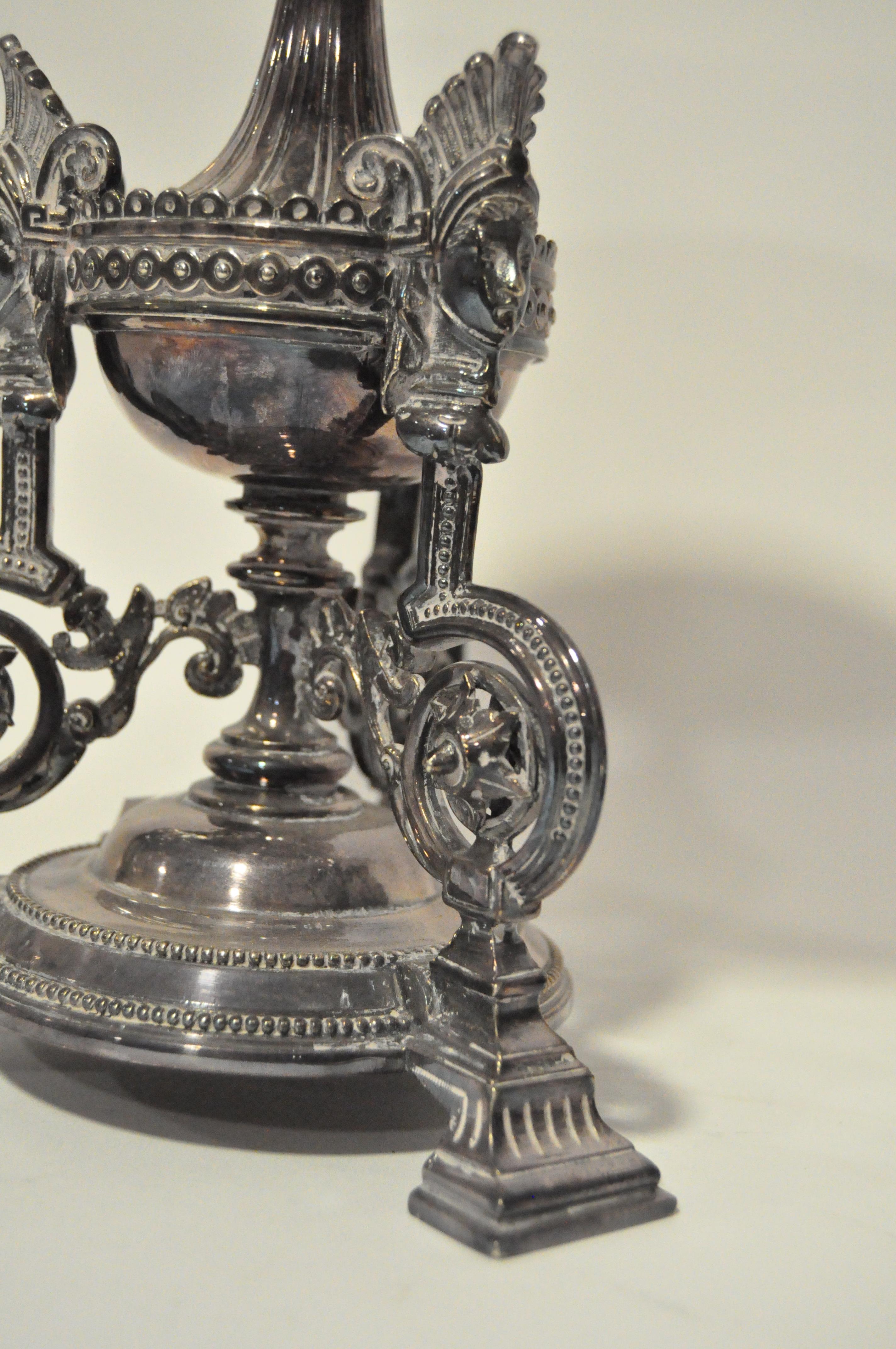 A pair of Victorian silver plated stands, in the classical design with tripod bases, - Image 2 of 2