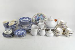 A collection of 20th Century ceramics, including plates and bowls in the 'Old Willow' pattern,