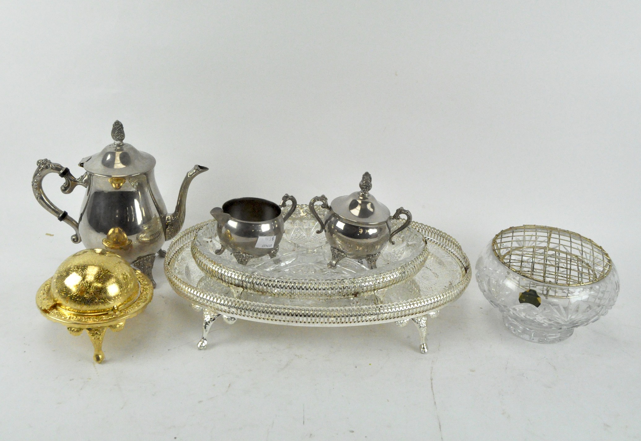 A 20th Century silver plated teapot, sugar bowl and milk jug, together with trays,