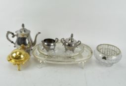 A 20th Century silver plated teapot, sugar bowl and milk jug, together with trays,