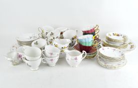 A Royal Stuart harlequin part tea-service in fluted form with gilt rims, comprising: six teacups,