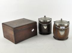 Two EPNS oak biscuit barrels together with a carved wooden box