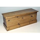 A contemporary pine blanket box, of rectangular form,