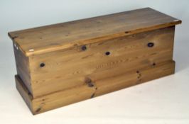 A contemporary pine blanket box, of rectangular form,