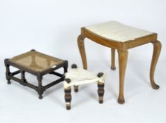 Three stools and a bentwood child's chair, one of the stools clad in hide,