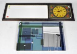 Two modern mirrors to include a blue abstract example and and a hall mirror with clock,